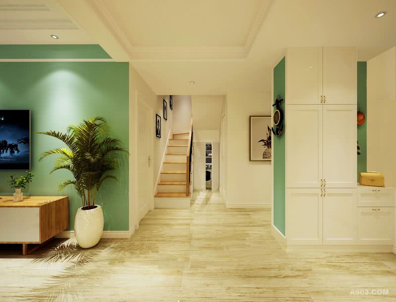    走廊处，大面积采用白色，并采用淡绿色作为修饰，使空间清新而自然，顶面造型简约而时尚，玄关柜的使用也恰到好处，既很好的起到了遮挡做用，也为空间增加了储物作用，美观而实用。