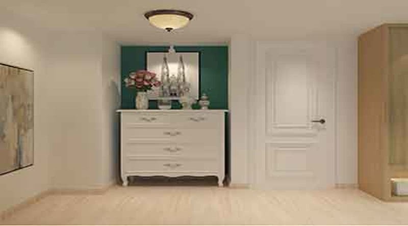    在卧室进门处，设计五斗柜的摆放位置，既美观又多了收纳的
空间，墙面也使用墨绿色，与床头的颜色呼应，在简单的墙面上，
采用油画作为装饰，使空间更加的丰富多彩。