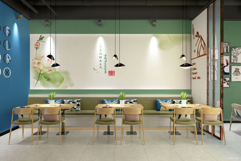 卡座墙面采用壁纸装饰，上下两边的绿色石膏板装饰使原本平面的壁纸装饰多了点层次感，加强整体视觉的空间感。