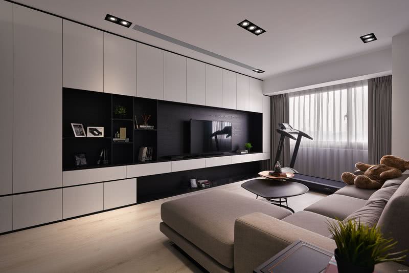 透過簡單俐落的線條，並利用色彩黑與白對比2:5，使得家中的心臟-客廳，呈現出寬闊簡約又不失優雅。
