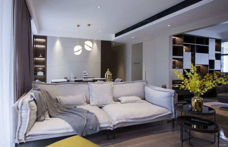 客厅以简洁的色块使得空间更加整洁大方，空间流线具有灵动性。