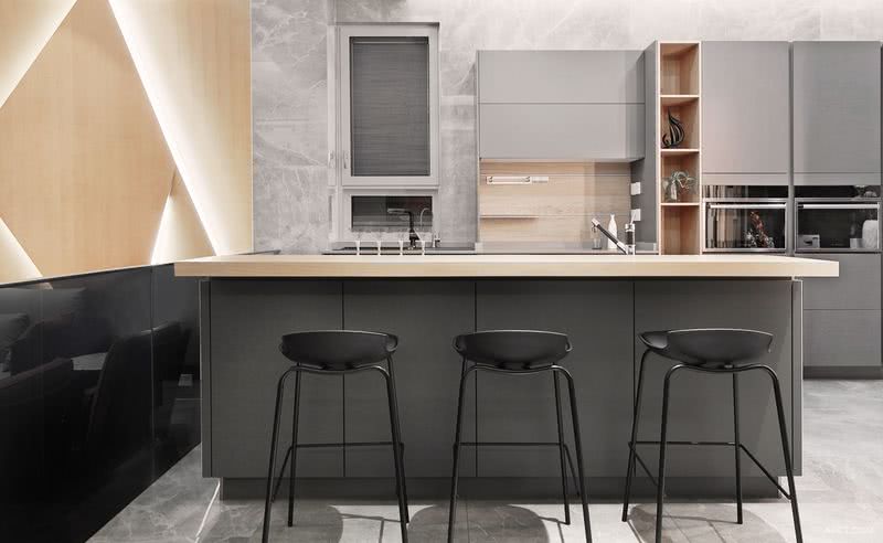 开放式厨房集休闲与实用一体，岛台台面采用石英石搭配灰色烤漆门板，中西厨分离的形式，新颖时尚。也是高品质家居的一种体现。