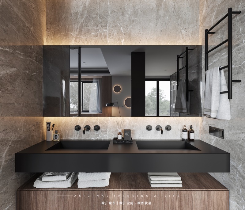 大理石墙面，杜邦石的洗手盆，搭配黑色的烘干毛巾架，整个空间给人以独特的粗犷大胆的氛围感。