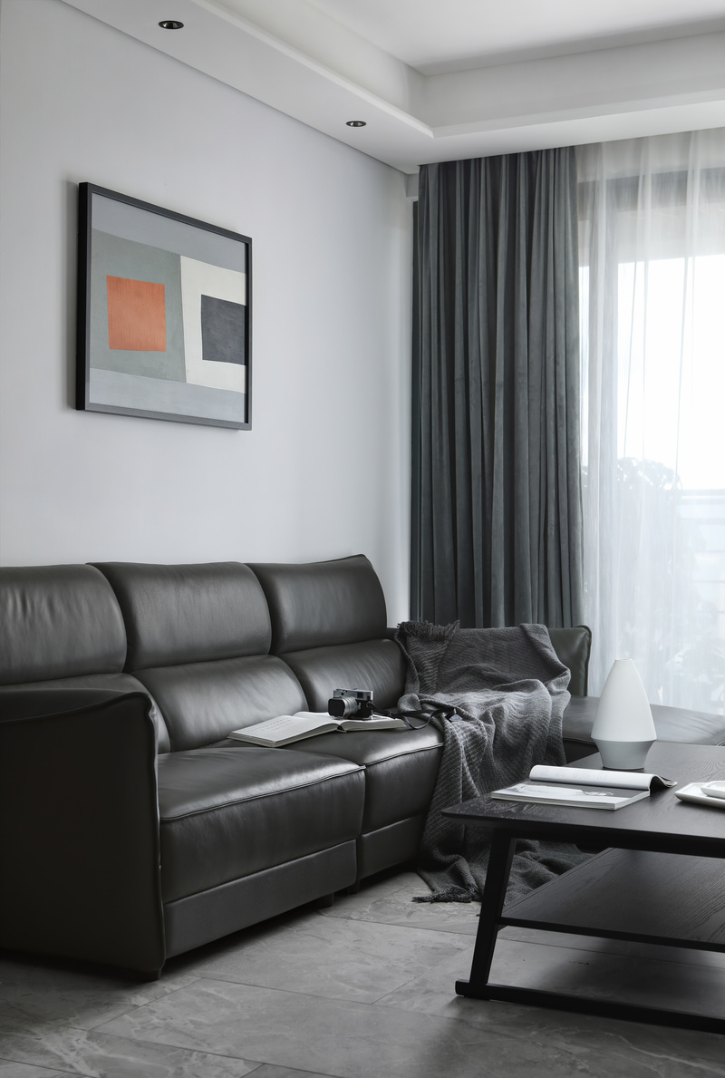 ▲皮质的沙发让空间多了一份光泽感，柔和了空间的气质。