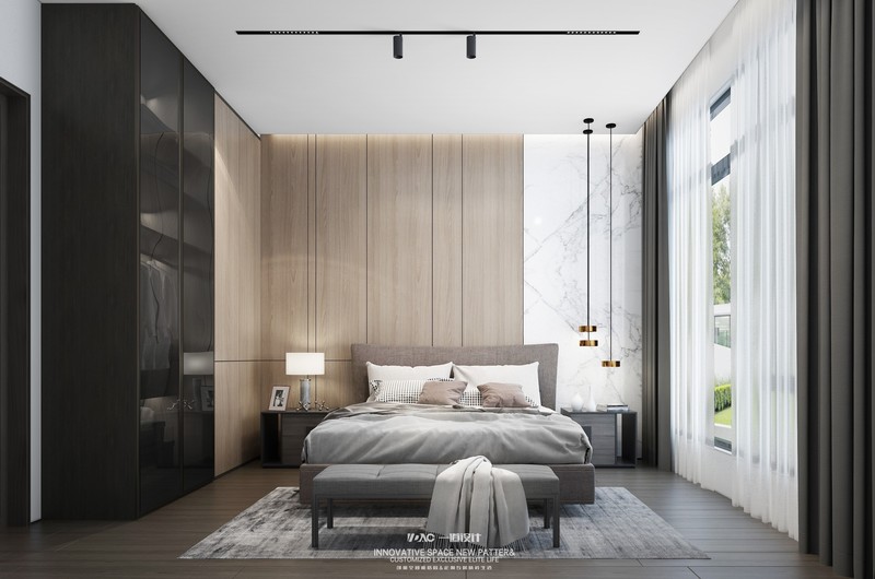 床头背景以大理石，木饰面转折延伸衣柜一体设计，金属质感的吊灯点缀整个空间。