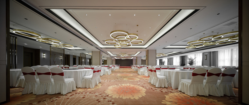 宴会厅融入中华文化中“圆”的理念，吊顶灯饰采用圆形框架进行呼应，分布于宴会厅的左中右区域，寓意“圆满”。
