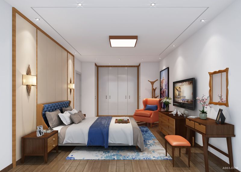 开门迎来的是一副蓝色水彩挂画与橙色休闲椅营造的景观，让整个卧室空间生动起来。
